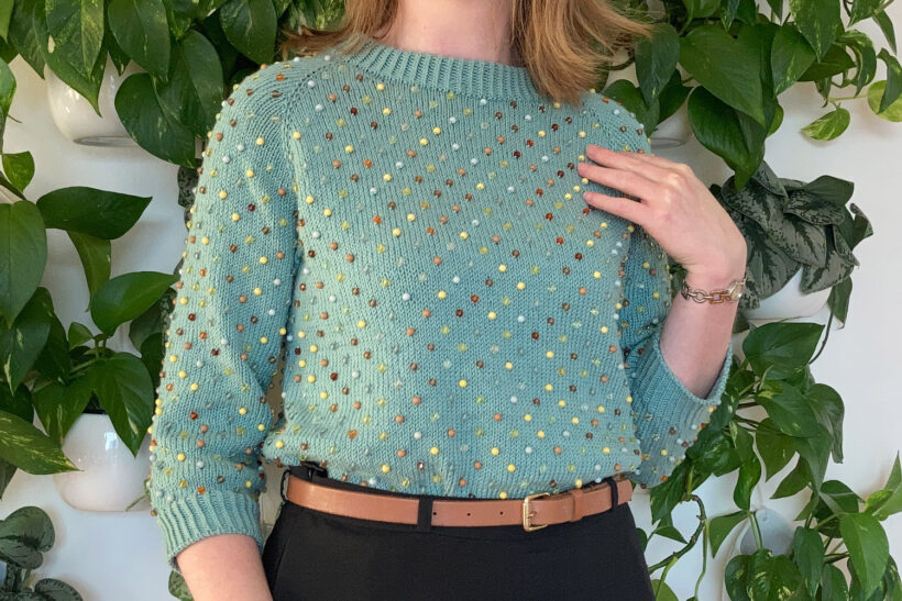 Strikket turkis perlesweater