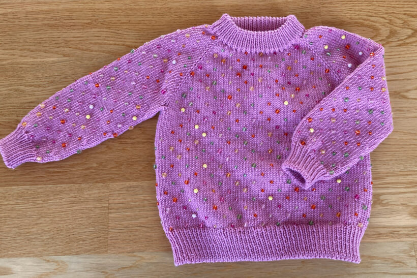 Strikket pink perlesweater