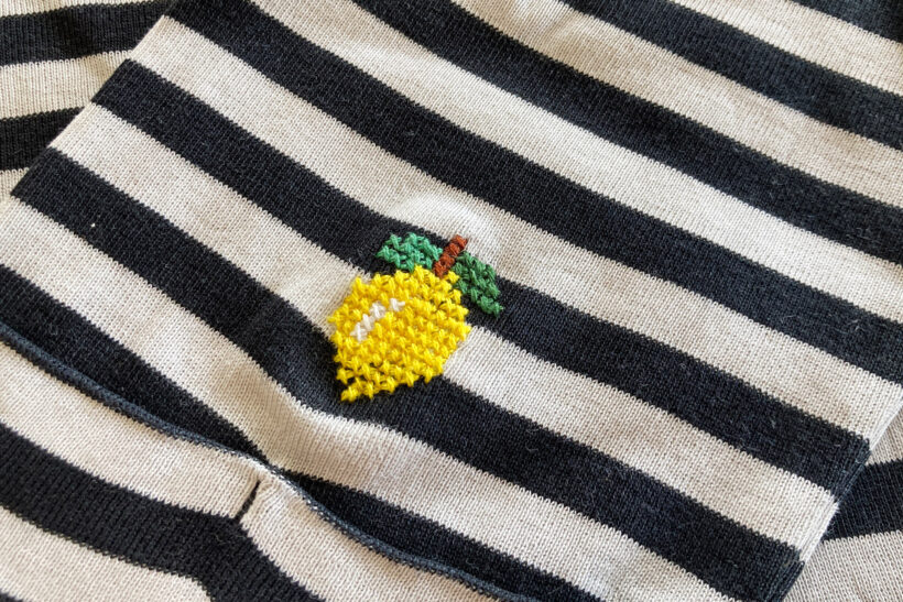 reparation med citron i korsstingsbroderi