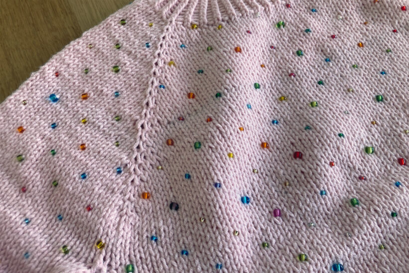 Lille perlesweater